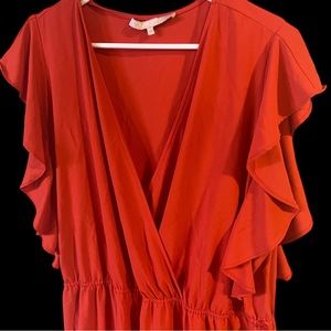 Red ruffle sleeve jumpsuit.